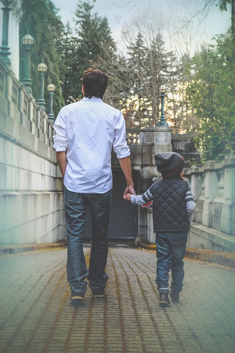 Walking with his children - child support consultation | The Micklin Law Group, LLC